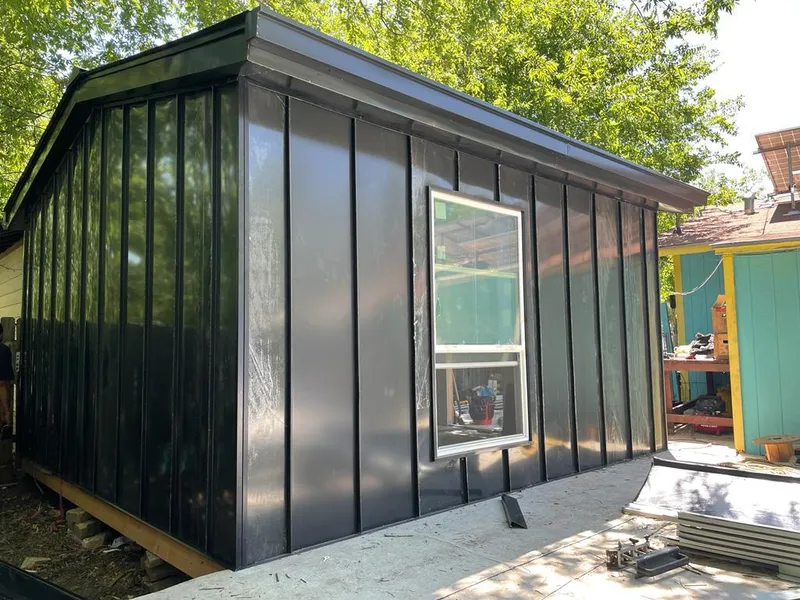 Black standing seam metal wall panels for Roof Inspection in Tucson